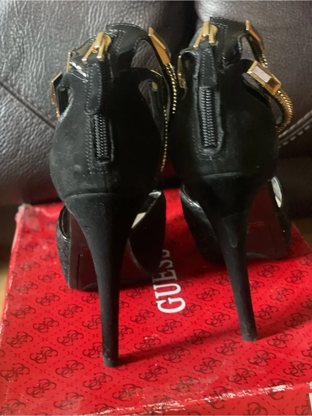 black peep-toe platform high heels by Guess featuring metallic gold double-wrap